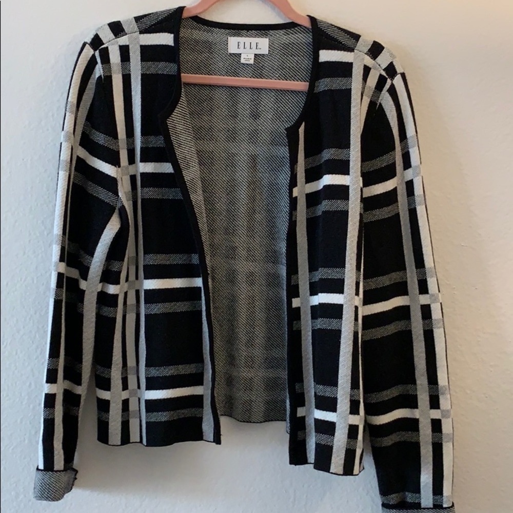 Checkered black and white open front cardigan.